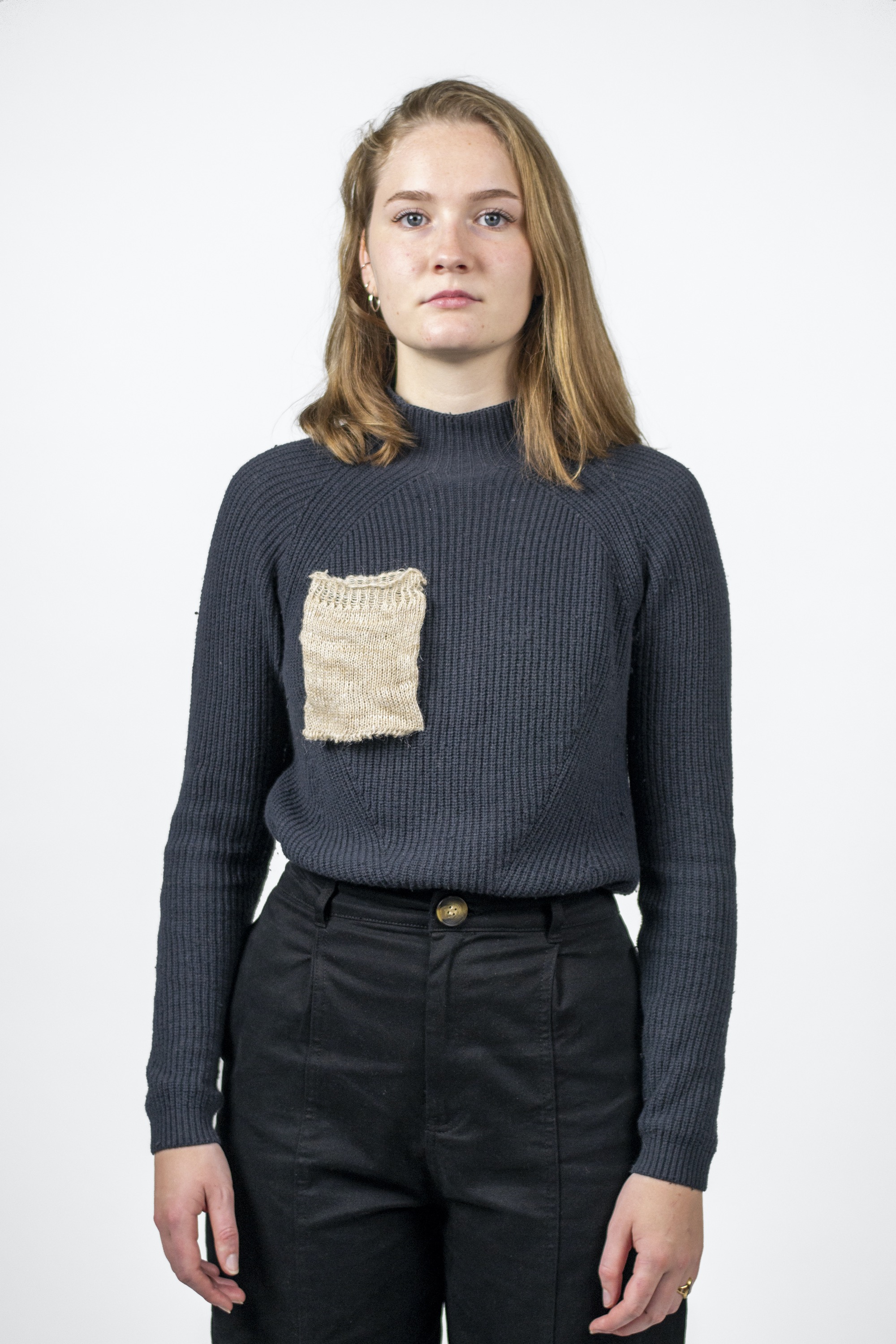 A model wearing repaired jumper
